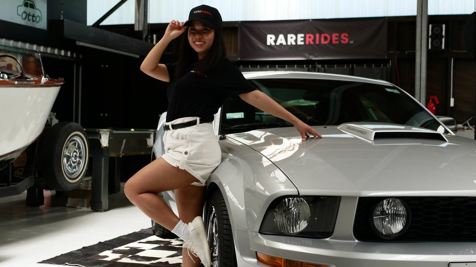 In the Rare Rides workshop with the Mustang and the classic boat