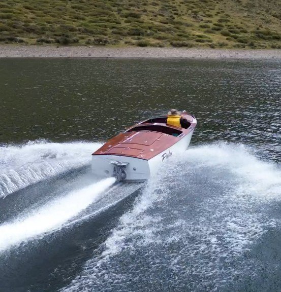 The classic boat Ruby powering across the water