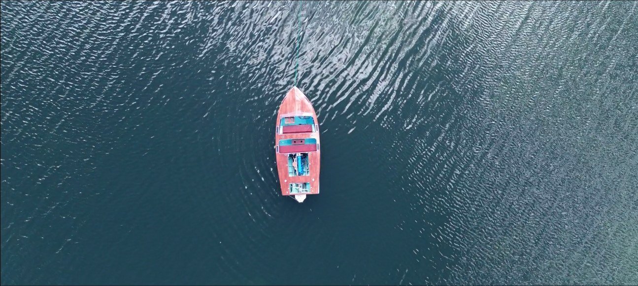 The classic boat Ruby on the water, aerial view
